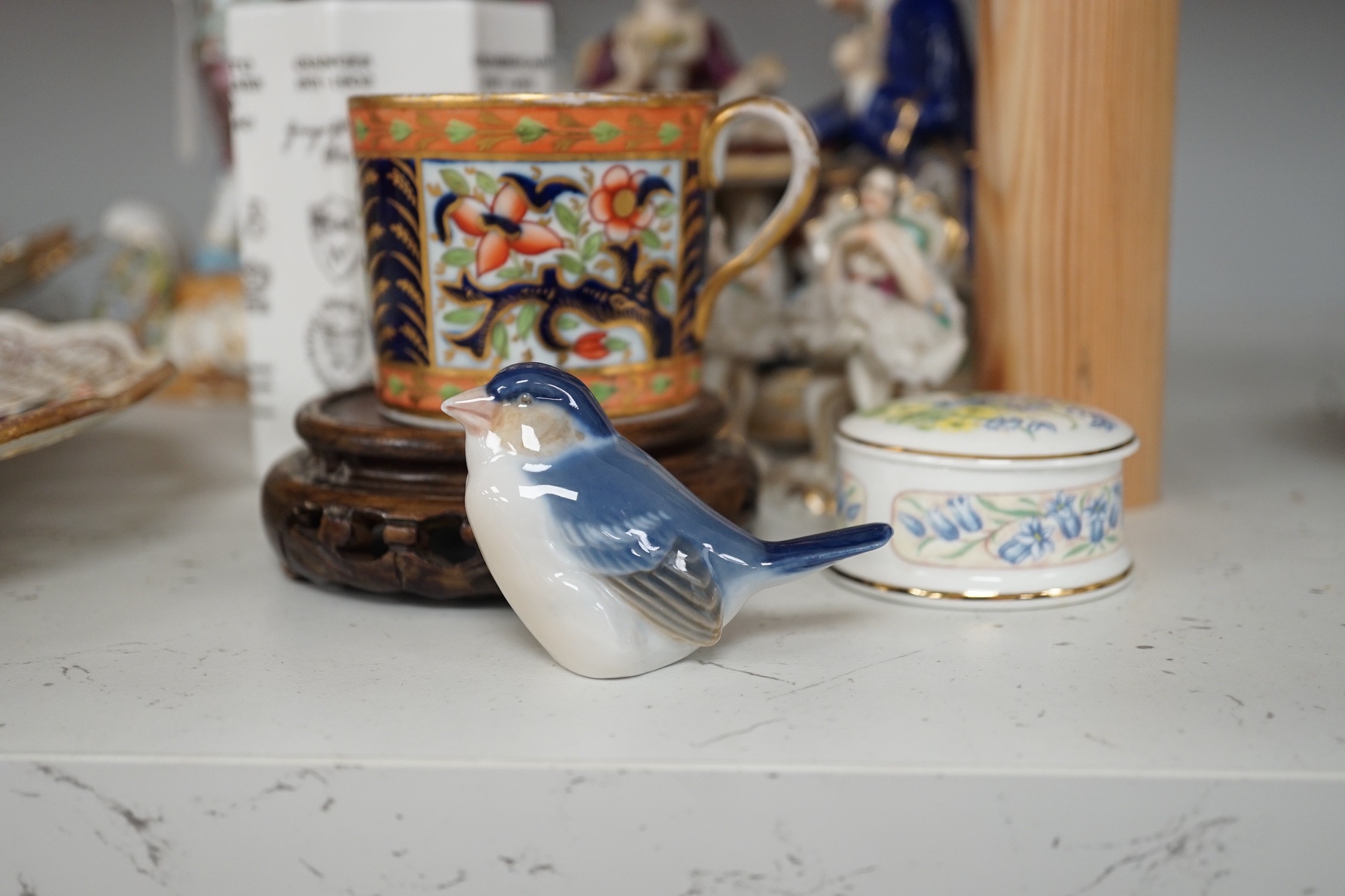 Two Meissen leaf dishes, a Dresden plate, two group figures and mixed ceramics, tallest 25cms high